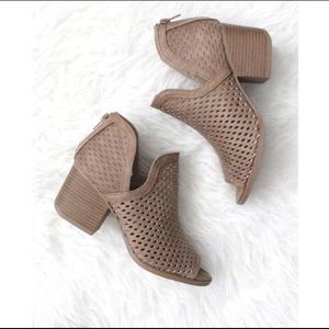 Qupid perforated slit ankle booties